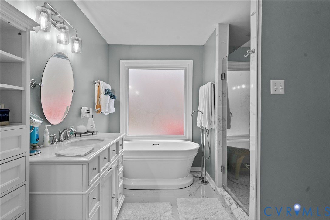 1937 Woodberry Mill Road Powhatan, VA 23139 - Photo 35 of 60 a bathroom with a toilet a sink and a mirror