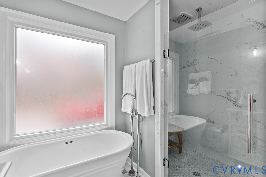 1937 Woodberry Mill Road Powhatan, VA 23139 - Photo 36 of 60 a bathroom with a tub and a shower