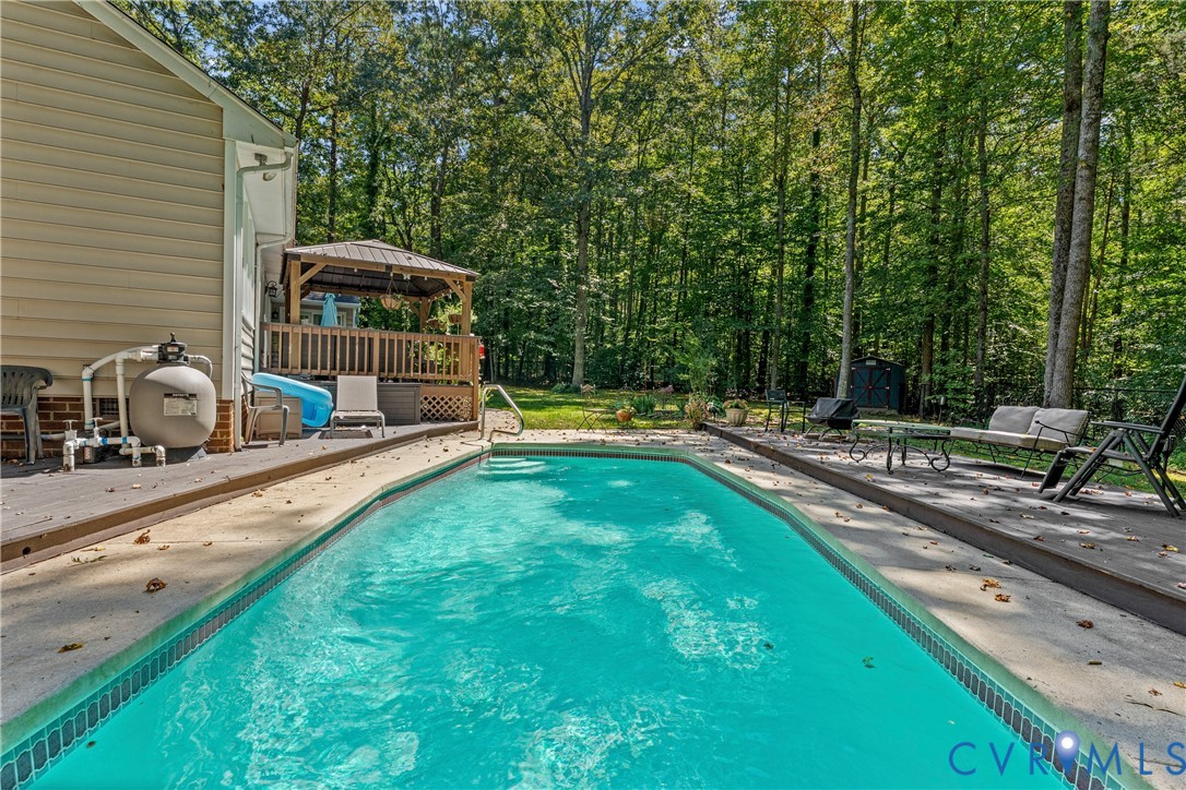 1937 Woodberry Mill Road Powhatan, VA 23139 - Photo 51 of 60 a view of a house with backyard and sitting area