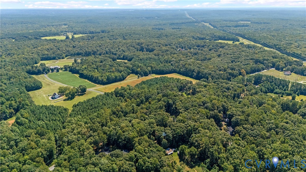 1937 Woodberry Mill Road Powhatan, VA 23139 - Photo 58 of 60 an aerial view of a house with a yard