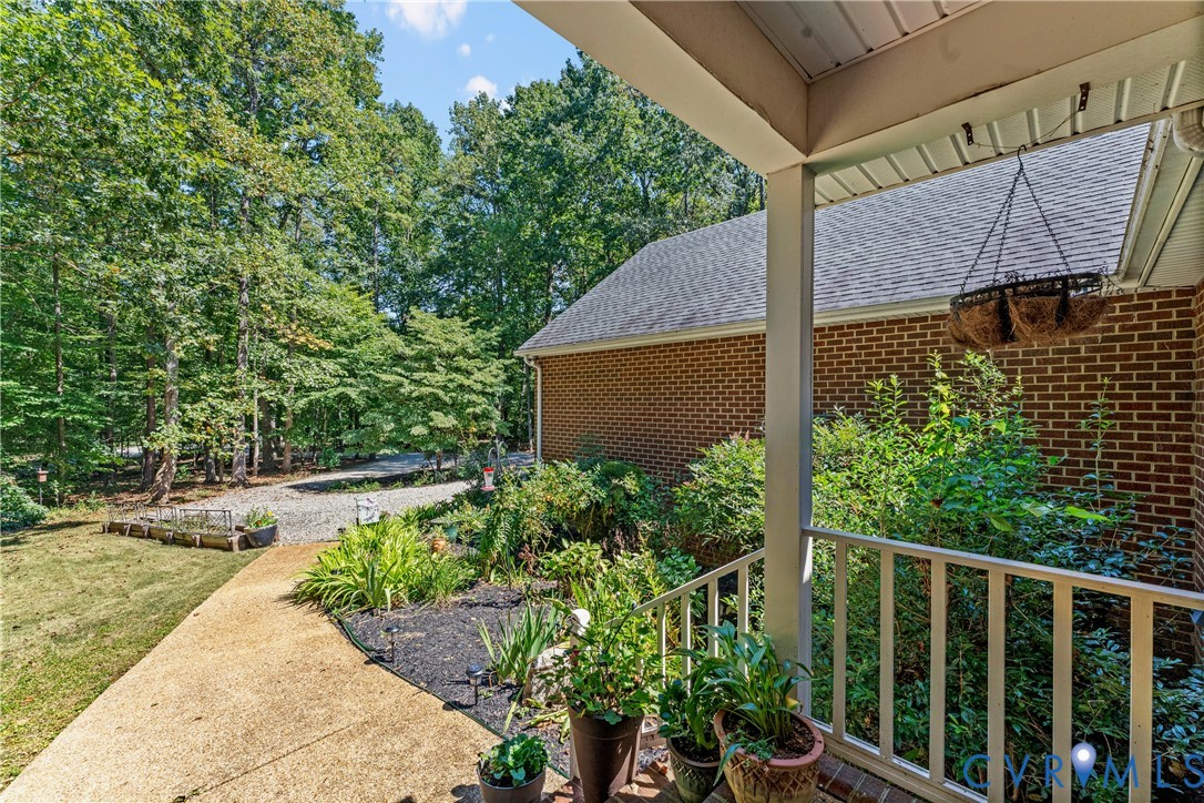 1937 Woodberry Mill Road Powhatan, VA 23139 - Photo 6 of 60 a view of a backyard with garden