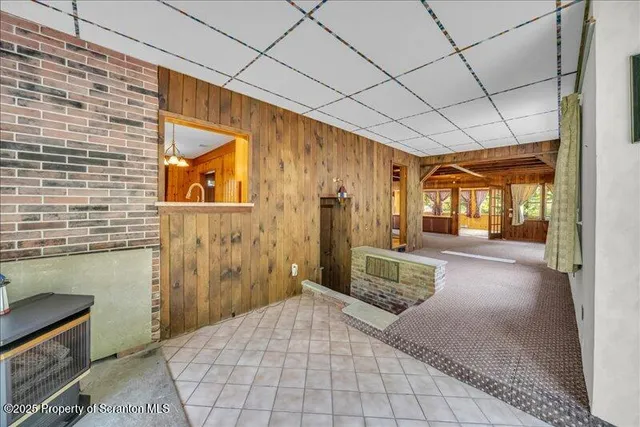 a kitchen with a stove a sink and a refrigerator