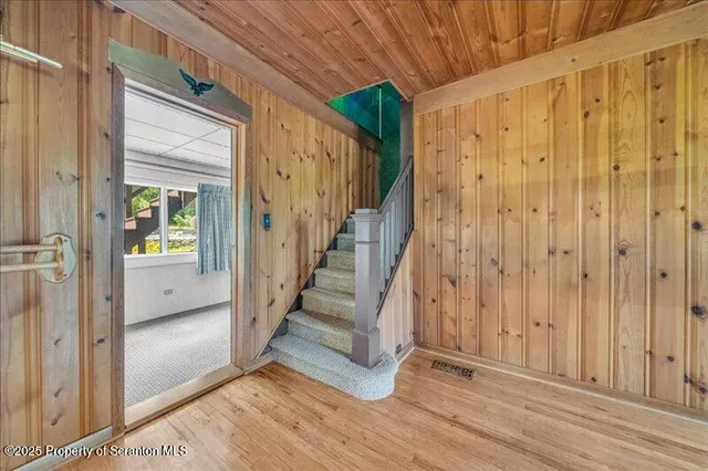 a view of a garage and car parked