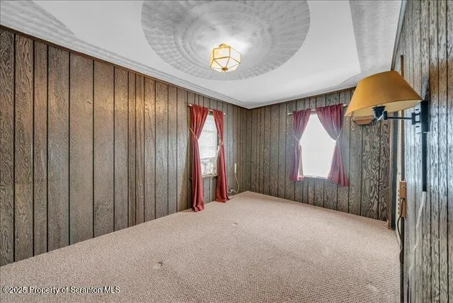 a view of balcony with wooden floor