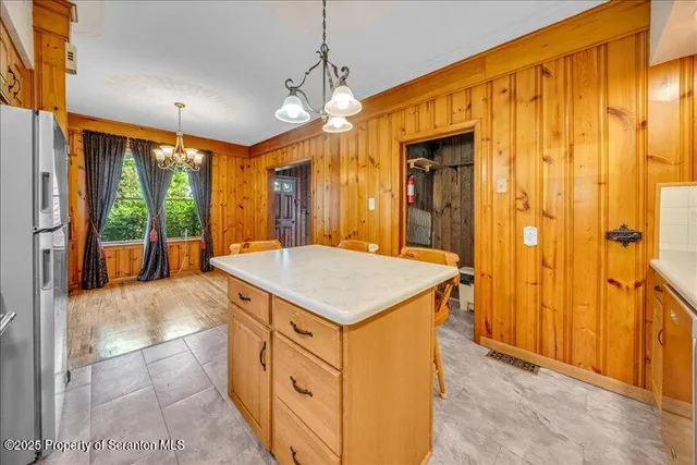 a view of a hallway with windows