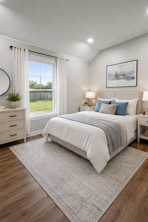 211 Crockett Street Rice, TX 75155 - Photo 7 of 12 a bedroom with a bed and a window