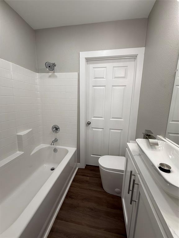 211 Crockett Street Rice, TX 75155 - Photo 9 of 12 a bathroom with a sink toilet and shower