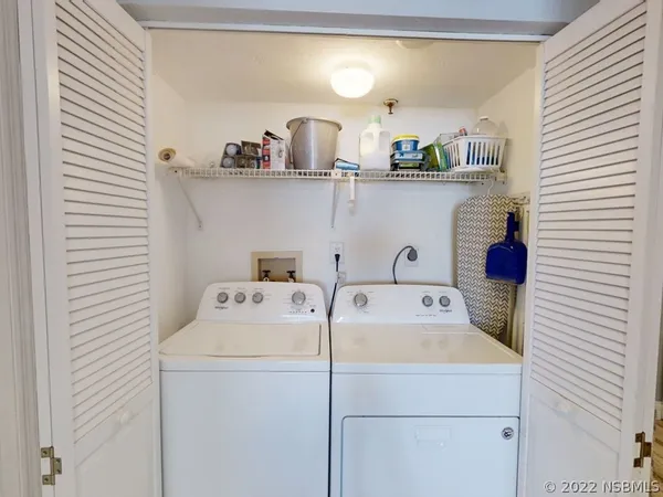 a view of a swimming pool with seating area