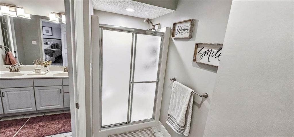 227 Meadow Spring Road Greensburg, PA 15601 - Photo 26 of 50 a bathroom with a double vanity sink and a mirror