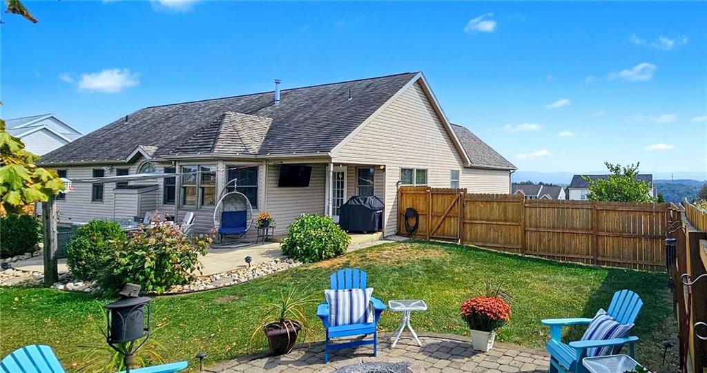 227 Meadow Spring Road Greensburg, PA 15601 - Photo 44 of 50 a view of a house with a yard and furniture