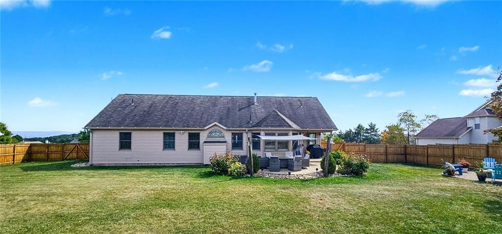 227 Meadow Spring Road Greensburg, PA 15601 - Photo 45 of 50 a view of a house with a backyard