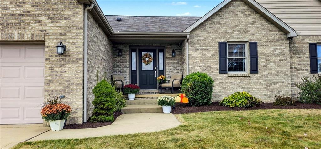 227 Meadow Spring Road Greensburg, PA 15601 - Photo 5 of 50 a view of a house with potted plants