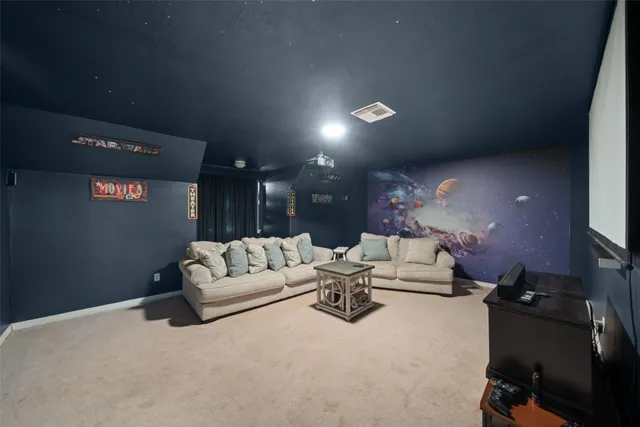 a living room with furniture and a couch