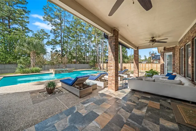 a living room with couch and a table