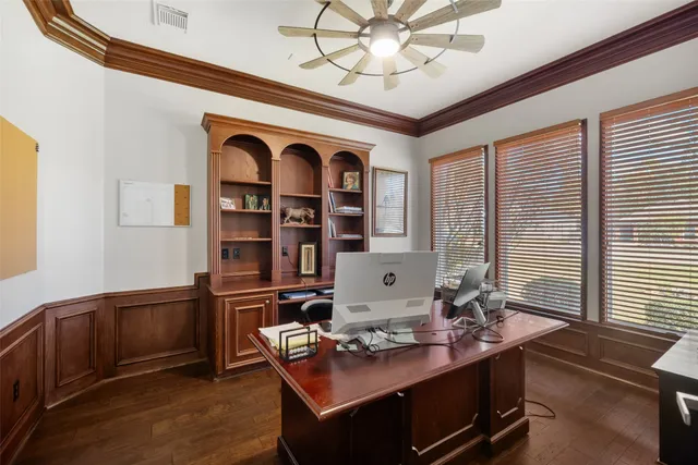 a workspace with furniture and window