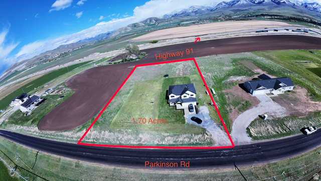 3607 South Parkinson Road South Franklin, ID 83237 - Photo 20 of 24 Aerial view of property and surrounding area featuring property boundaries highlighted and a mountain backdrop