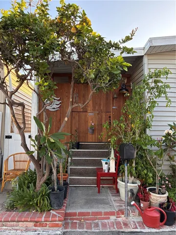 a view of a chairs and table in a patio