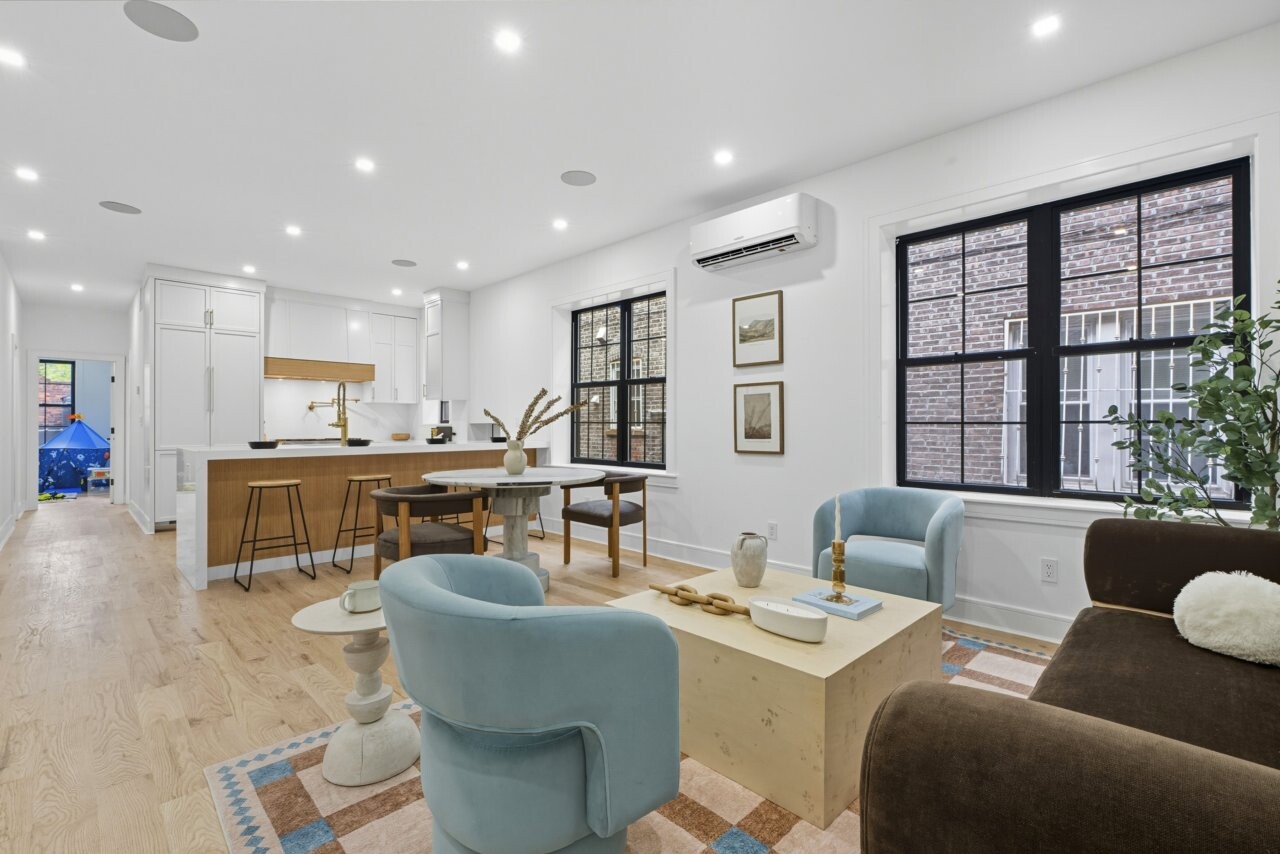 a living room with furniture and a table