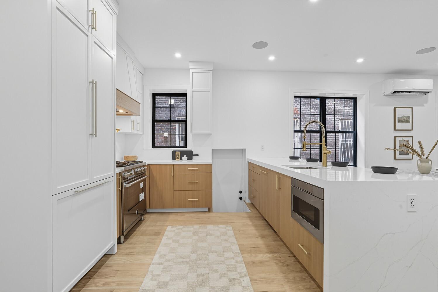 1109 Hancock Street Brooklyn, NY 11221 - Photo 13 of 30 a kitchen with stainless steel appliances granite countertop a refrigerator and a stove top oven