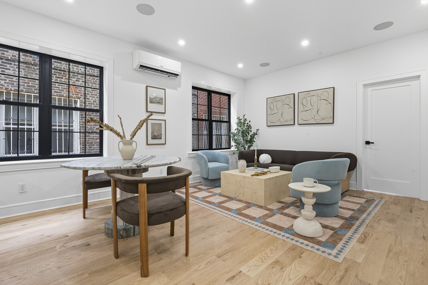1109 Hancock Street Brooklyn, NY 11221 - Photo 14 of 30 a living room with furniture a rug and a large window