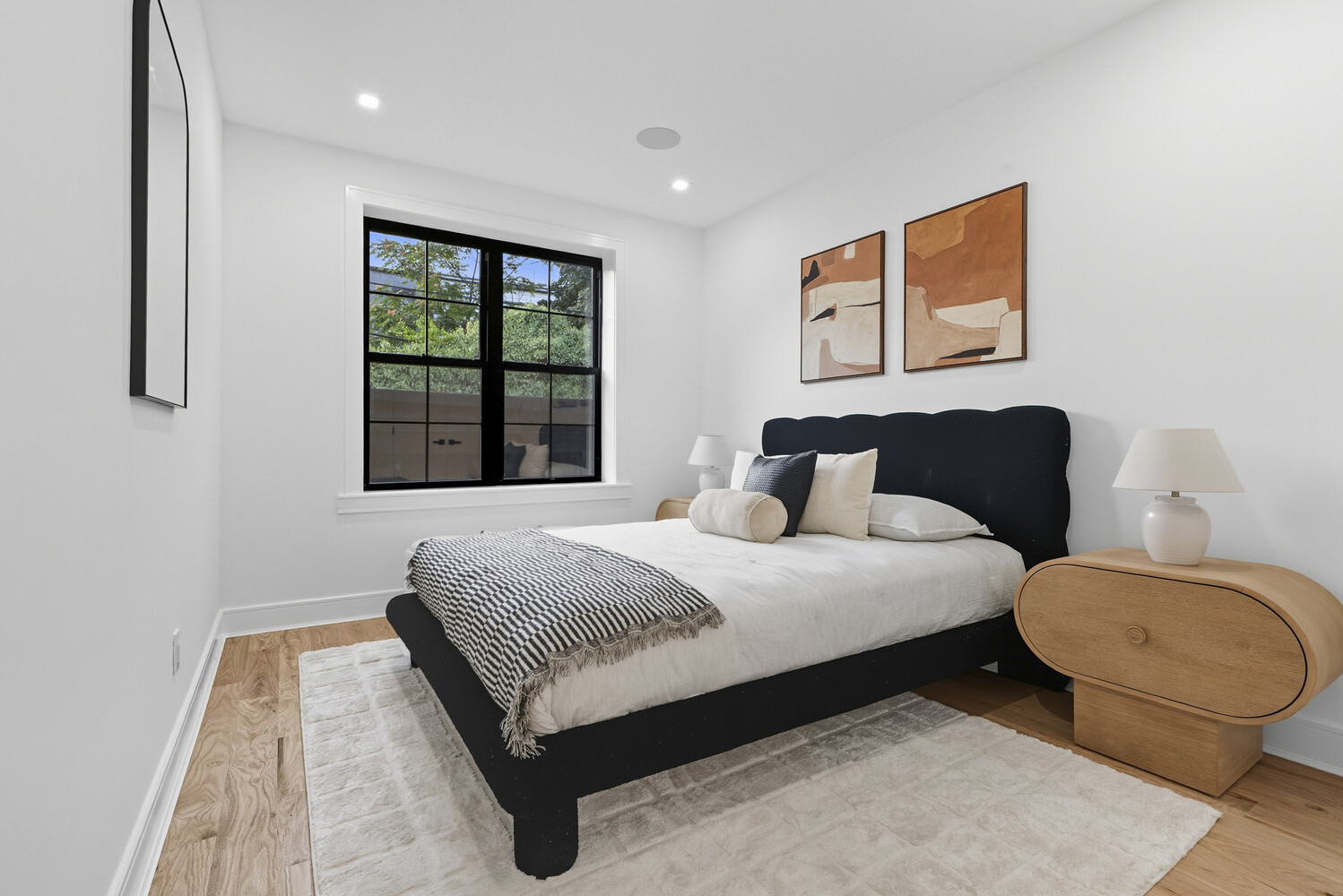 1109 Hancock Street Brooklyn, NY 11221 - Photo 22 of 30 a bedroom with a bed and window