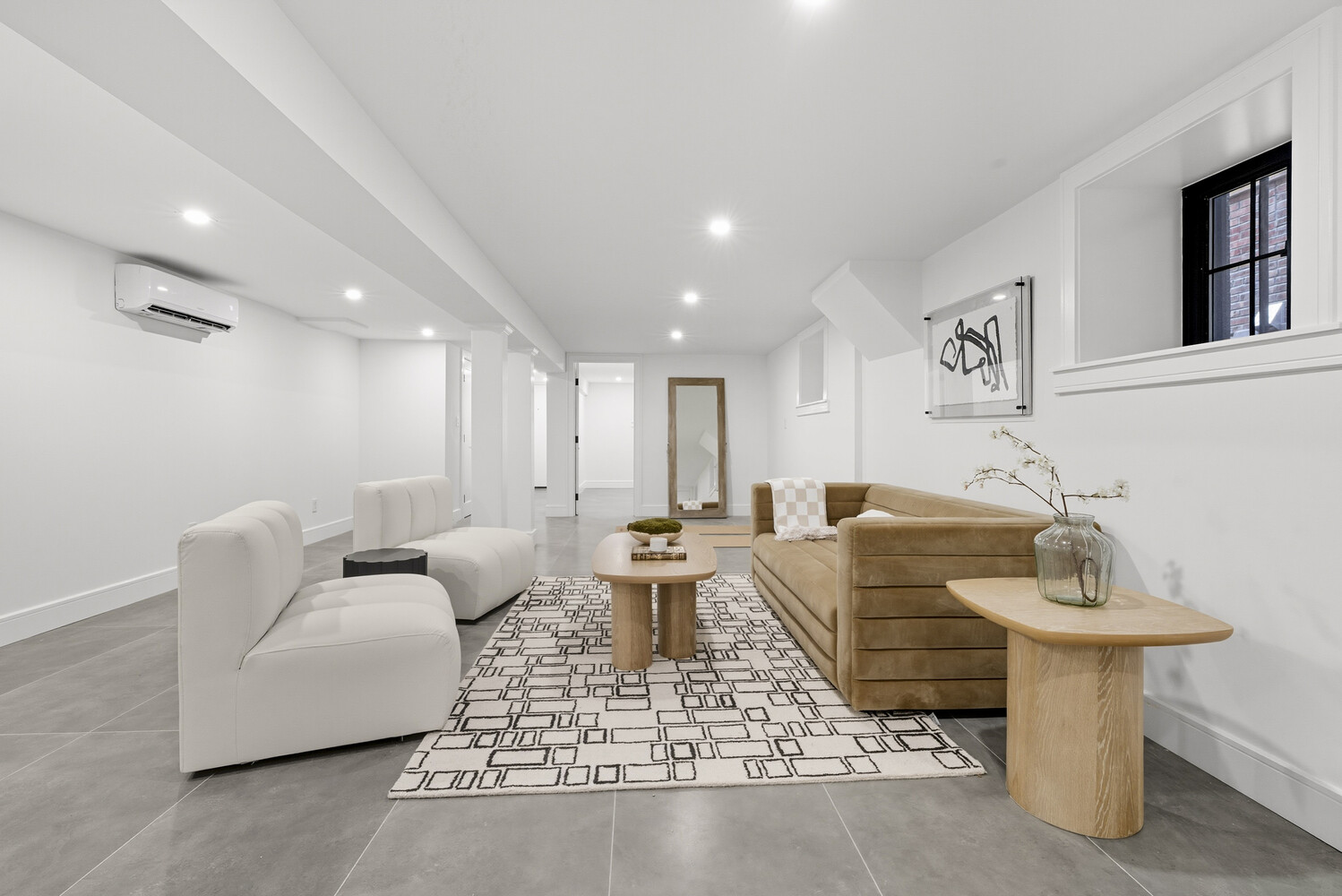 1109 Hancock Street Brooklyn, NY 11221 - Photo 27 of 30 a living room with furniture a rug and white walls