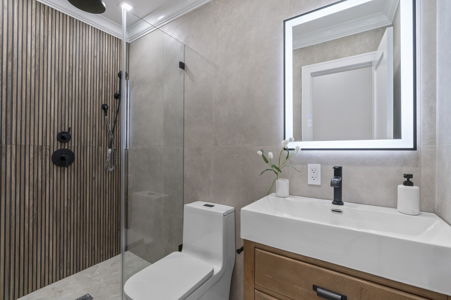 1109 Hancock Street Brooklyn, NY 11221 - Photo 29 of 30 a bathroom with a sink a toilet and shower