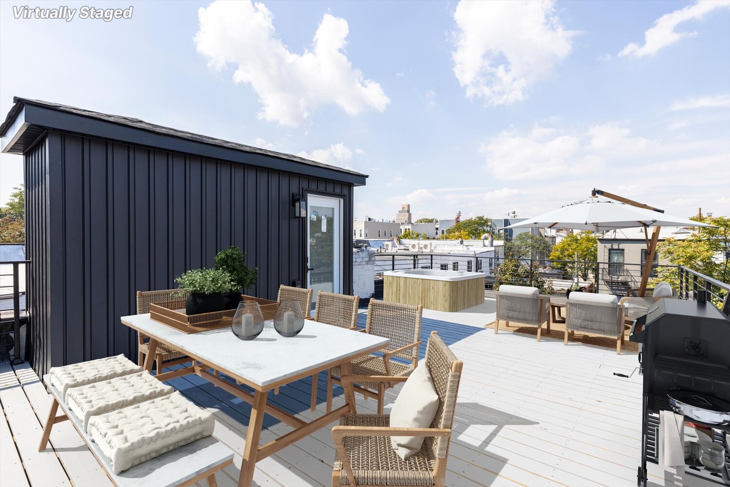 1109 Hancock Street Brooklyn, NY 11221 - Photo 2 of 30 a view of a patio with couches potted plants and a table
