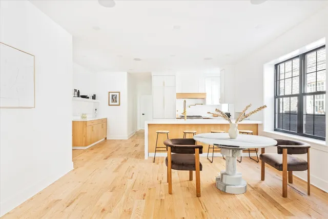 a kitchen with granite countertop a stove a sink and a granite counter tops