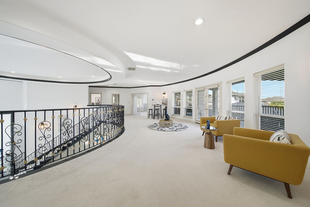 1907 Ray Shell Court Seabrook, TX 77586 - Photo 19 of 50 a view of a livingroom with furniture hardwood floor and windows
