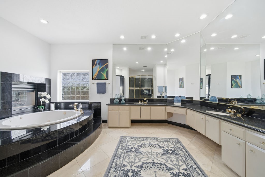 1907 Ray Shell Court Seabrook, TX 77586 - Photo 30 of 50 a large white kitchen with a large window