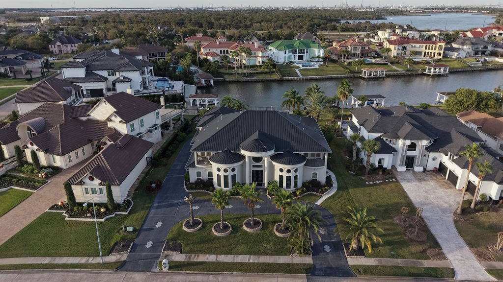 1907 Ray Shell Court Seabrook, TX 77586 - Photo 8 of 50 an aerial view of a house with a lake view