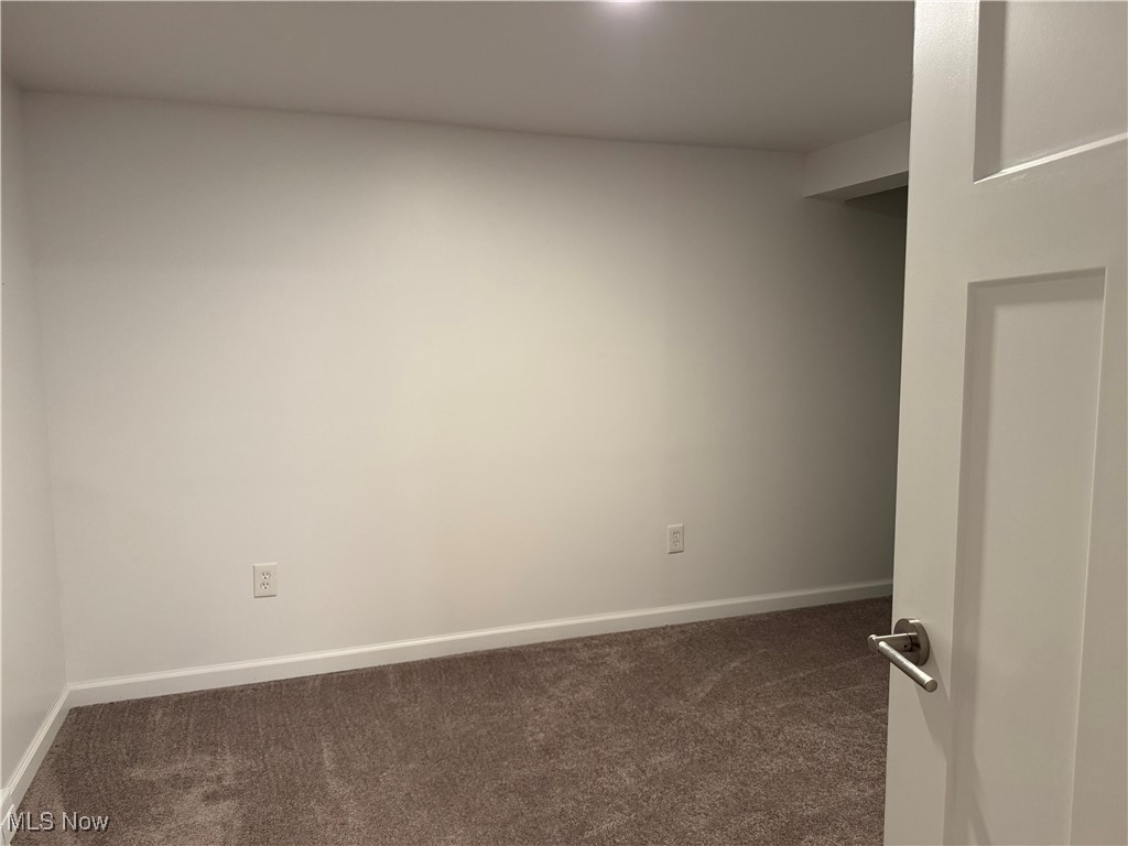 1139 Kessel Avenue Akron, OH 44310 - Photo 15 of 36 Carpeted empty room featuring baseboards