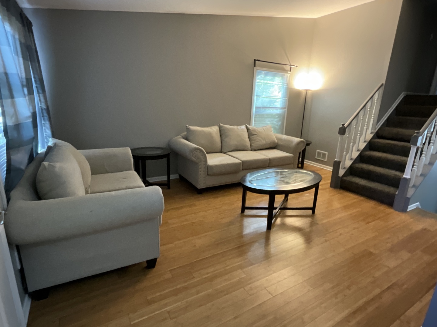 4033 Gregory Drive Zion, IL 60099 - Photo 3 of 16 a living room with furniture and a wooden floor
