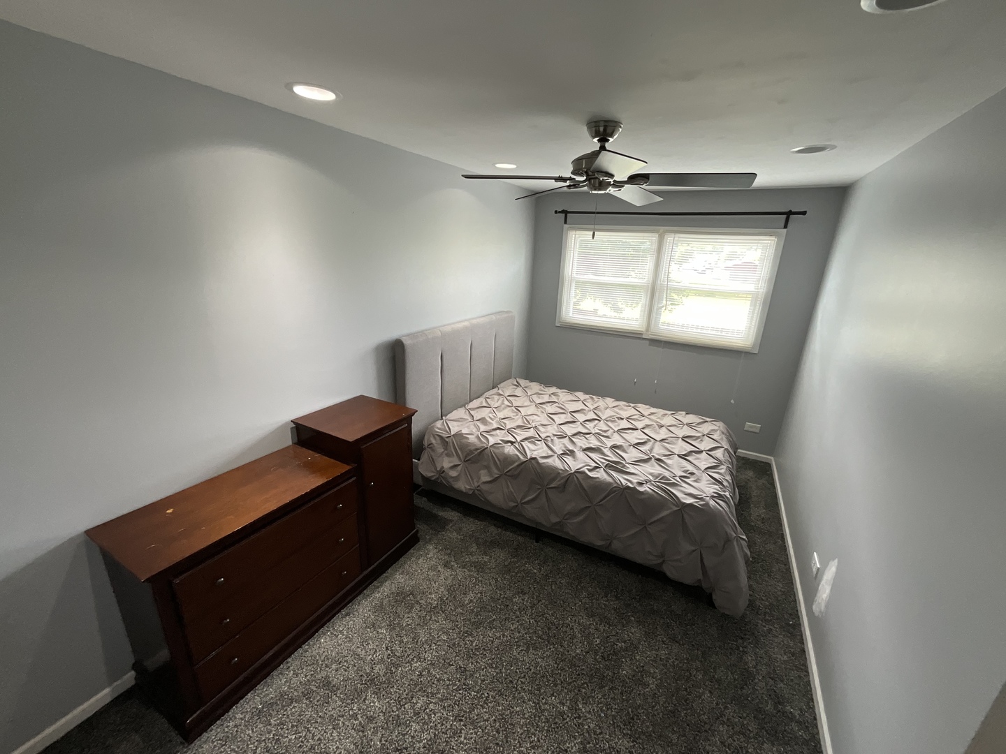 4033 Gregory Drive Zion, IL 60099 - Photo 6 of 16 a bedroom with a bed and window