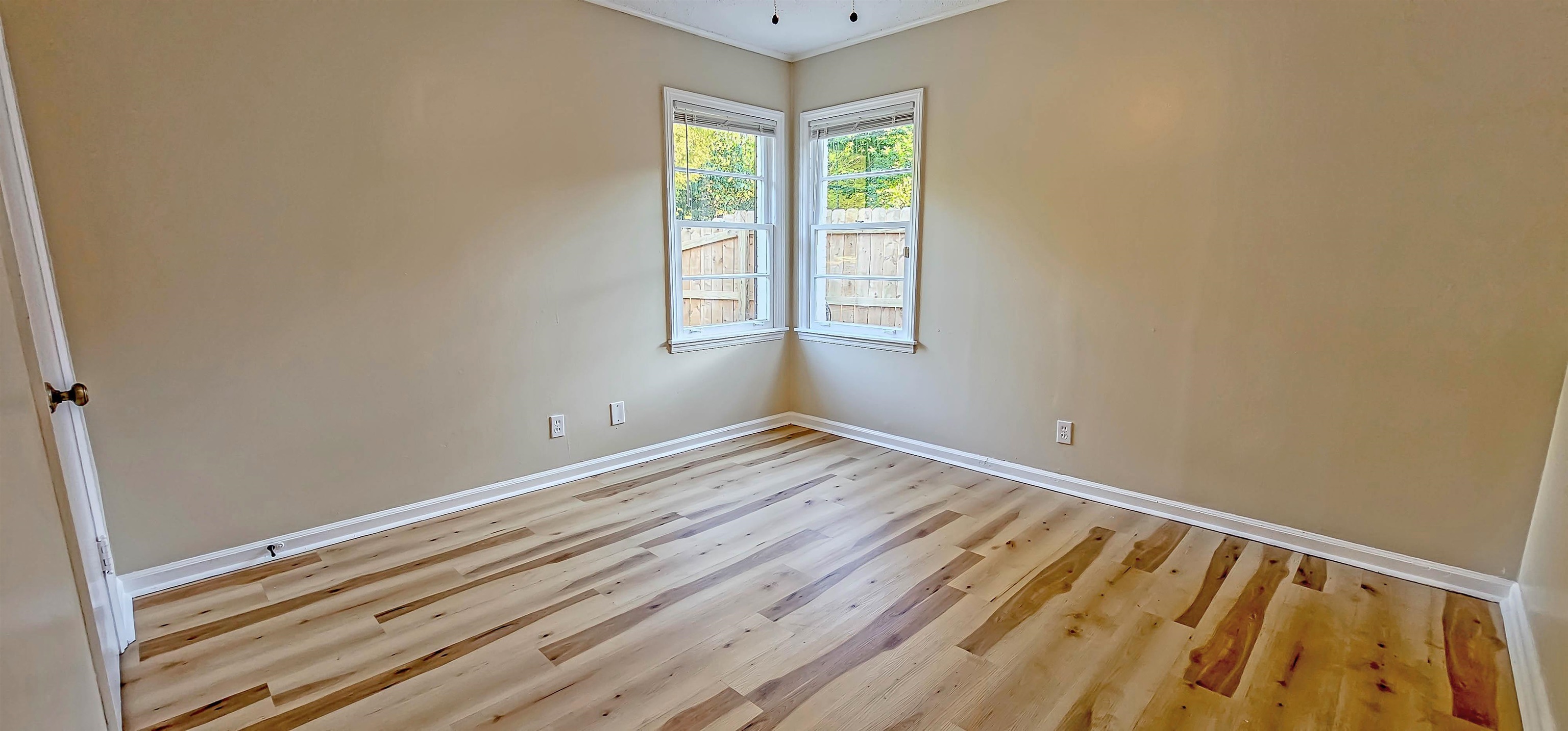 4420 Helene Road Memphis, TN 38117 - Photo 15 of 22 a view of a room with wooden floor and windows