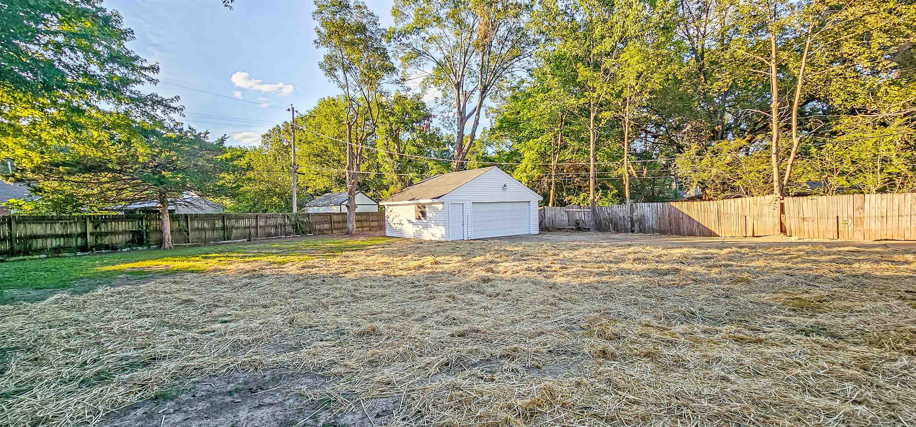 4420 Helene Road Memphis, TN 38117 - Photo 19 of 22 a house with trees in the background