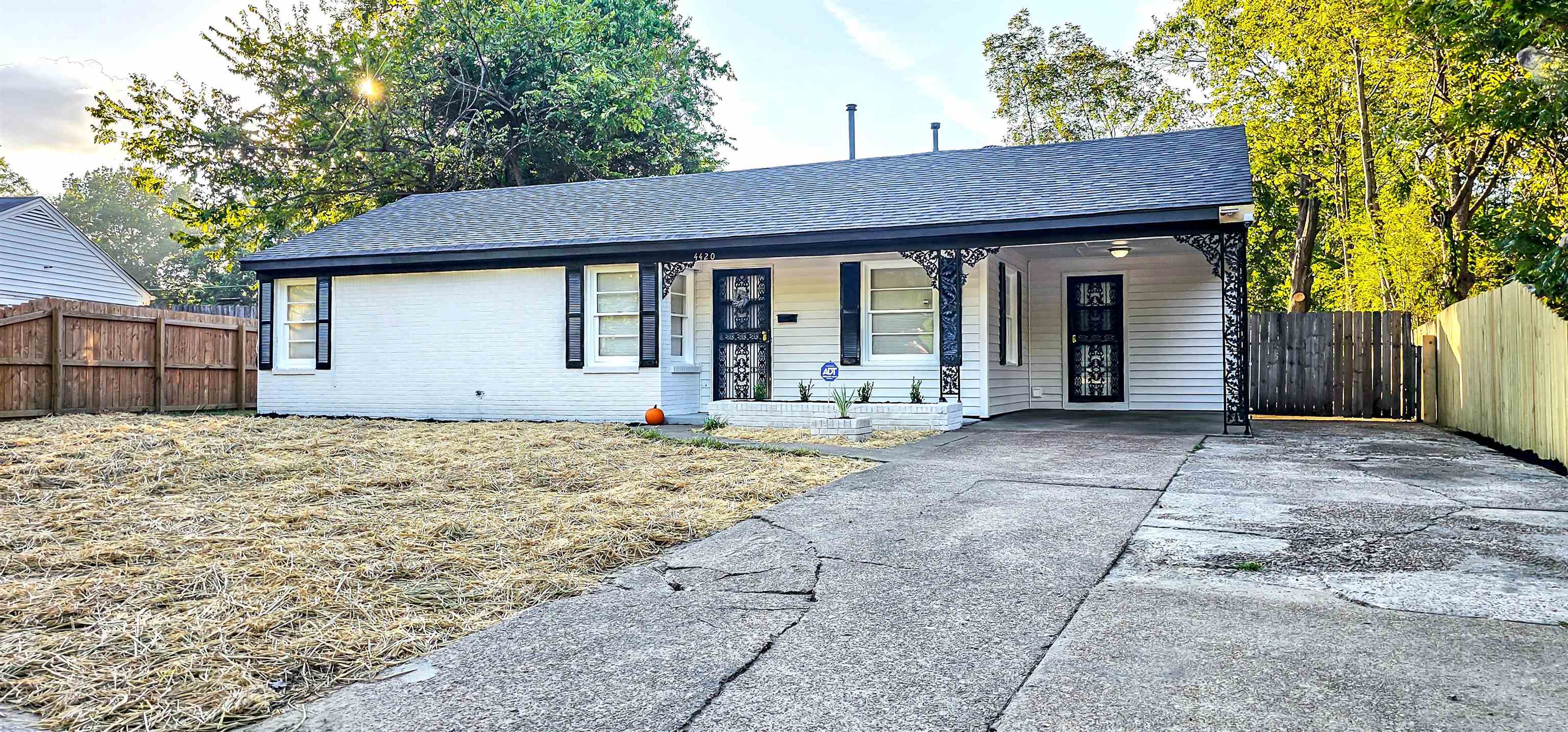 4420 Helene Road Memphis, TN 38117 - Photo 21 of 22 a house with trees in the background