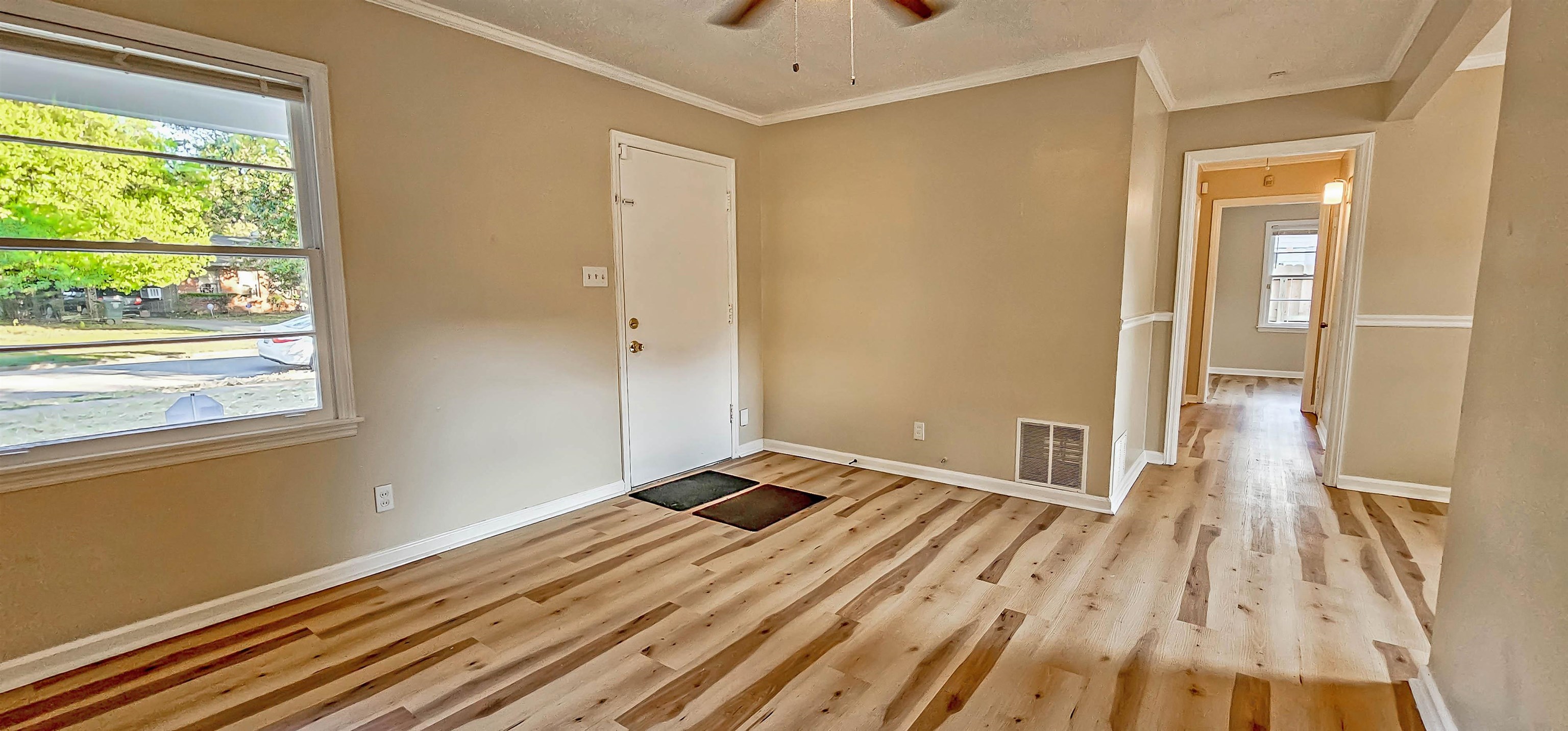 4420 Helene Road Memphis, TN 38117 - Photo 7 of 22 a view of a room with wooden floor and a sink