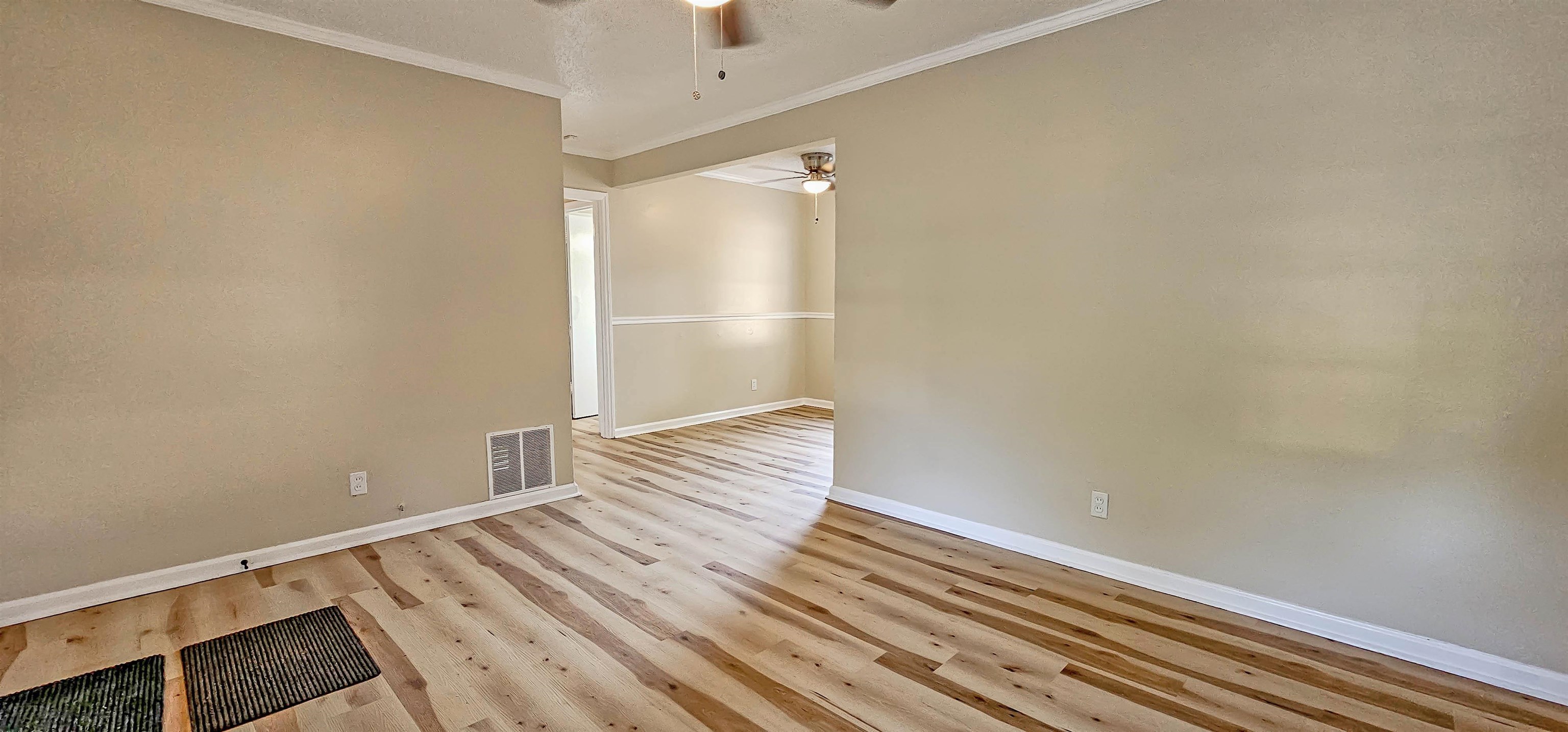 4420 Helene Road Memphis, TN 38117 - Photo 8 of 22 a view of a room with wooden floor and white walls