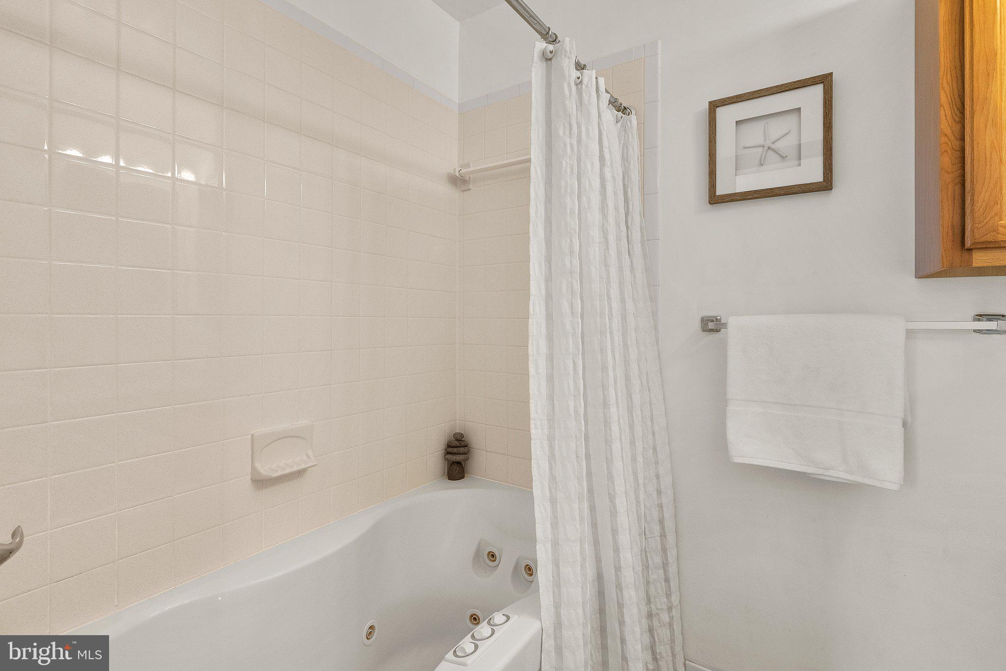 4945 Sargent Road Northeast Washington, DC 20017 - Photo 20 of 36 Upper Level
Primary Suite Bathroom