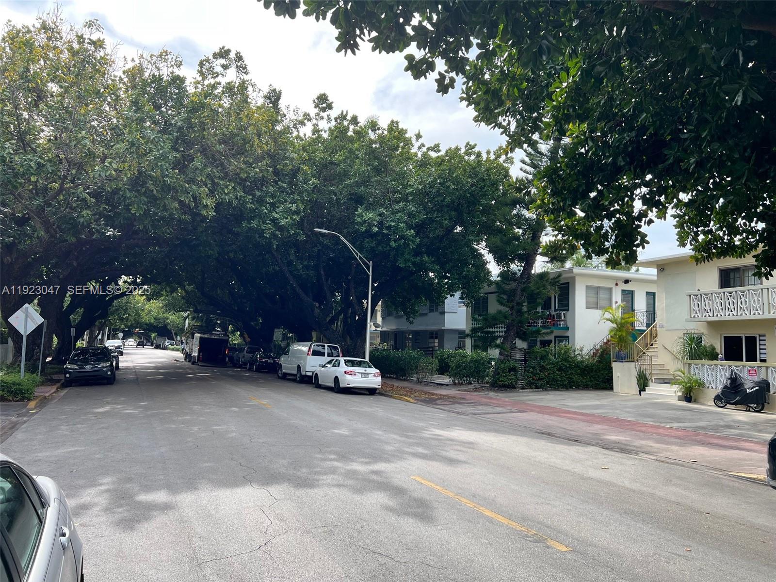 944 Meridian Avenue, Unit 10 Miami Beach, FL 33139 - Photo 15 of 15 a view of a car parked on the side of a road