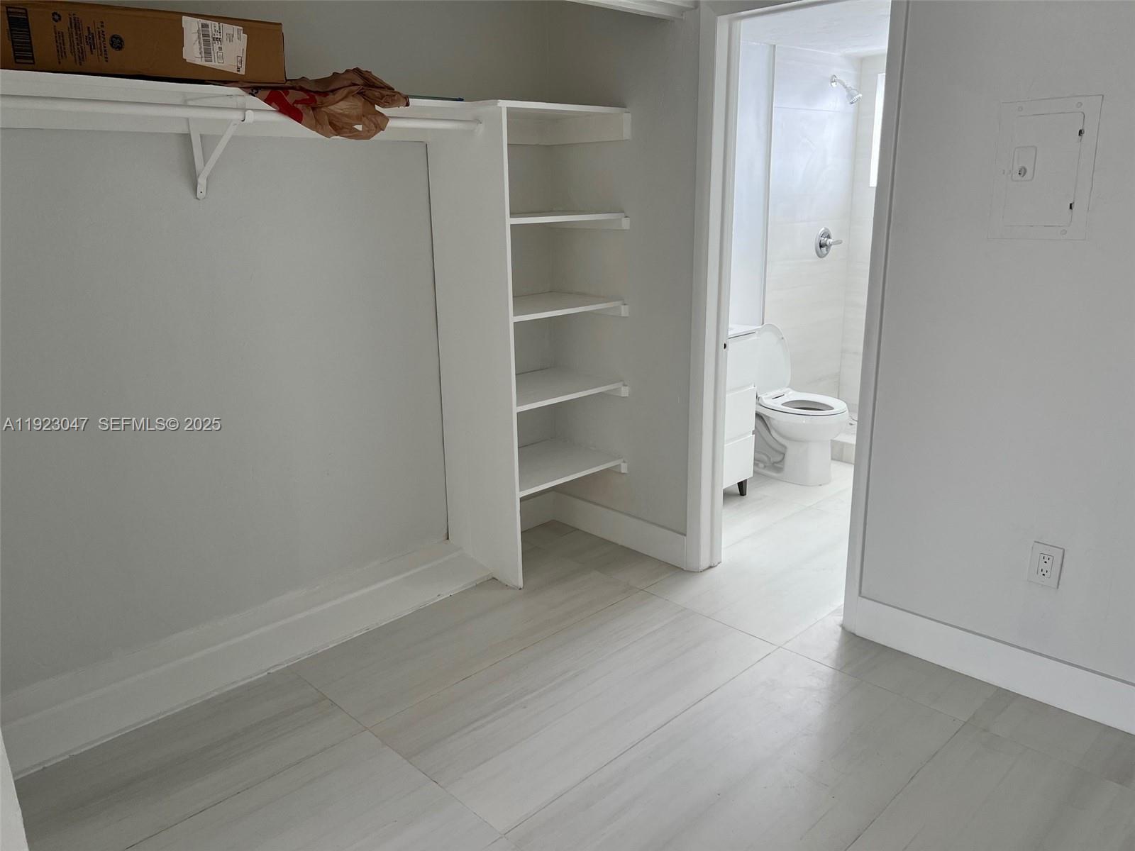 944 Meridian Avenue, Unit 10 Miami Beach, FL 33139 - Photo 3 of 15 a view of a walk in closet