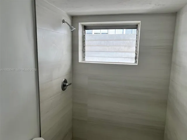a bathroom with a window