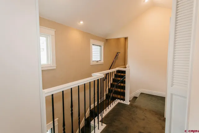 a view of entryway with stairs