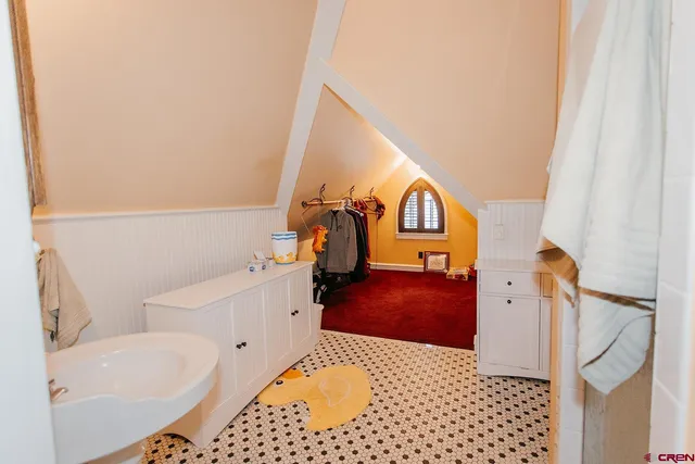 a bathroom with a bathtub sink and toilet