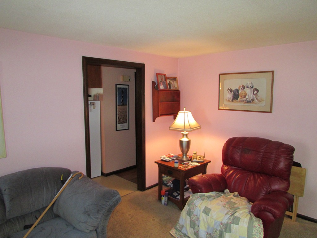 89 Clement Street Springfield, MA 01118 - Photo 8 of 14 a living room with furniture and a window