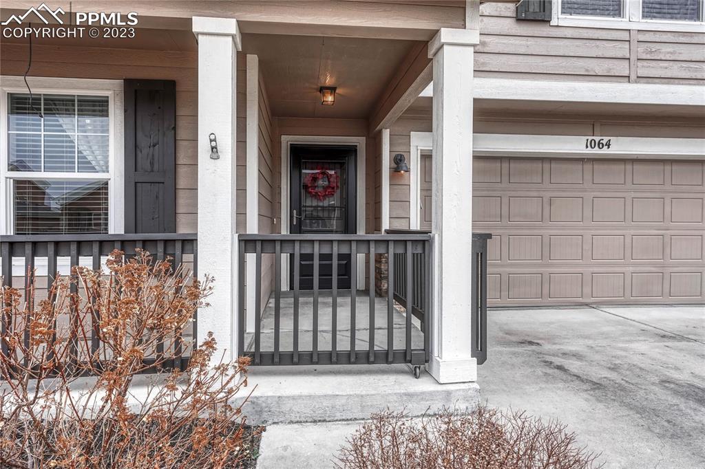 a view of a house with a small porch