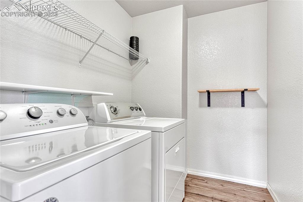 1064 Diamond Rim Drive Colorado Springs, CO 80921 - Photo 18 of 30 a utility room with dryer and washer