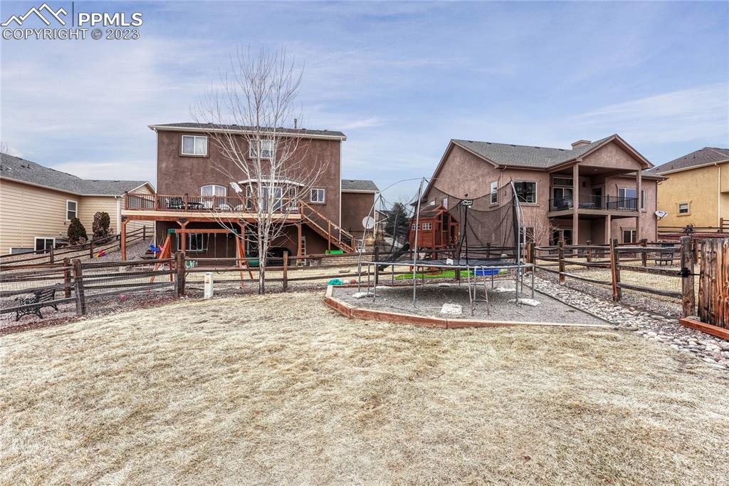 1064 Diamond Rim Drive Colorado Springs, CO 80921 - Photo 27 of 30 a view of a house with swimming pool